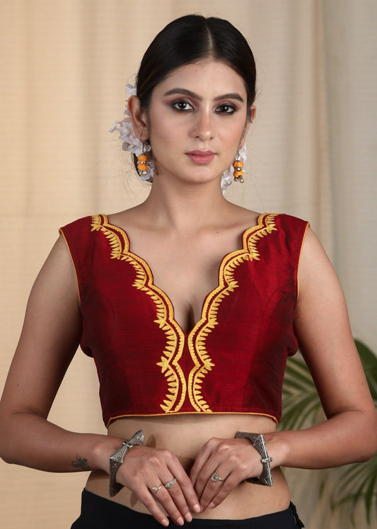 Maroon Cotton Silk Designer Blouse With Scallop Neck line, Contrast Embroidery and Bow At the Back