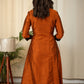 Exclusive Rust cotton silk dress with intricate hand embroidered motif