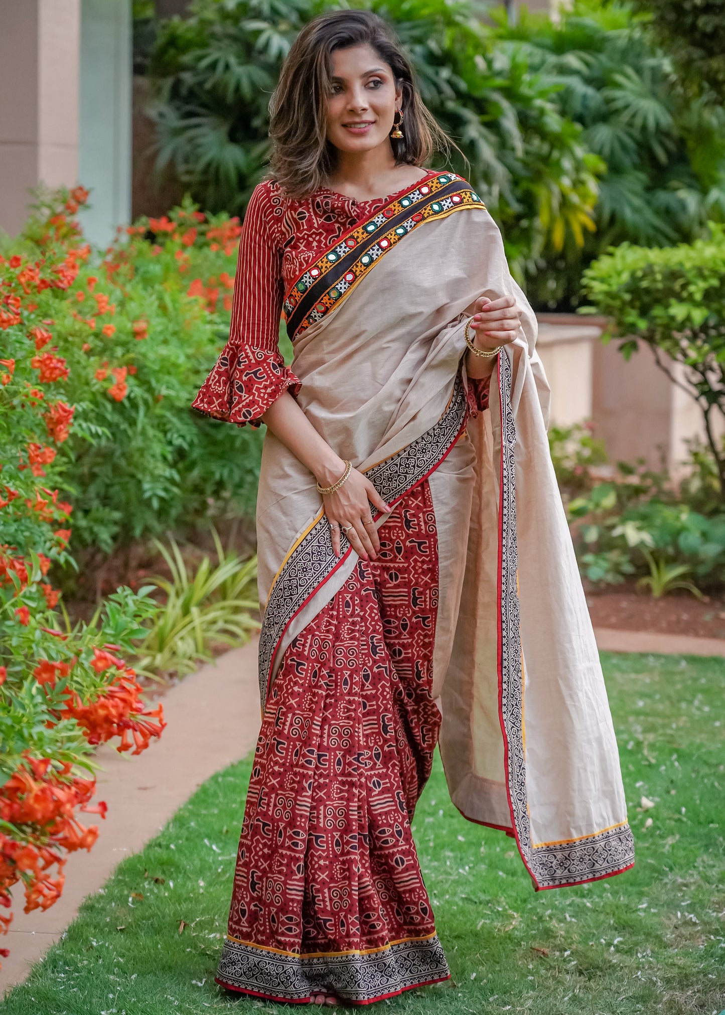 Elegant Ajrakh cotton saree with Kutch mirror work border