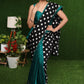 Exquisite black double Ikat & turquoise combination saree with hand painted Gond border