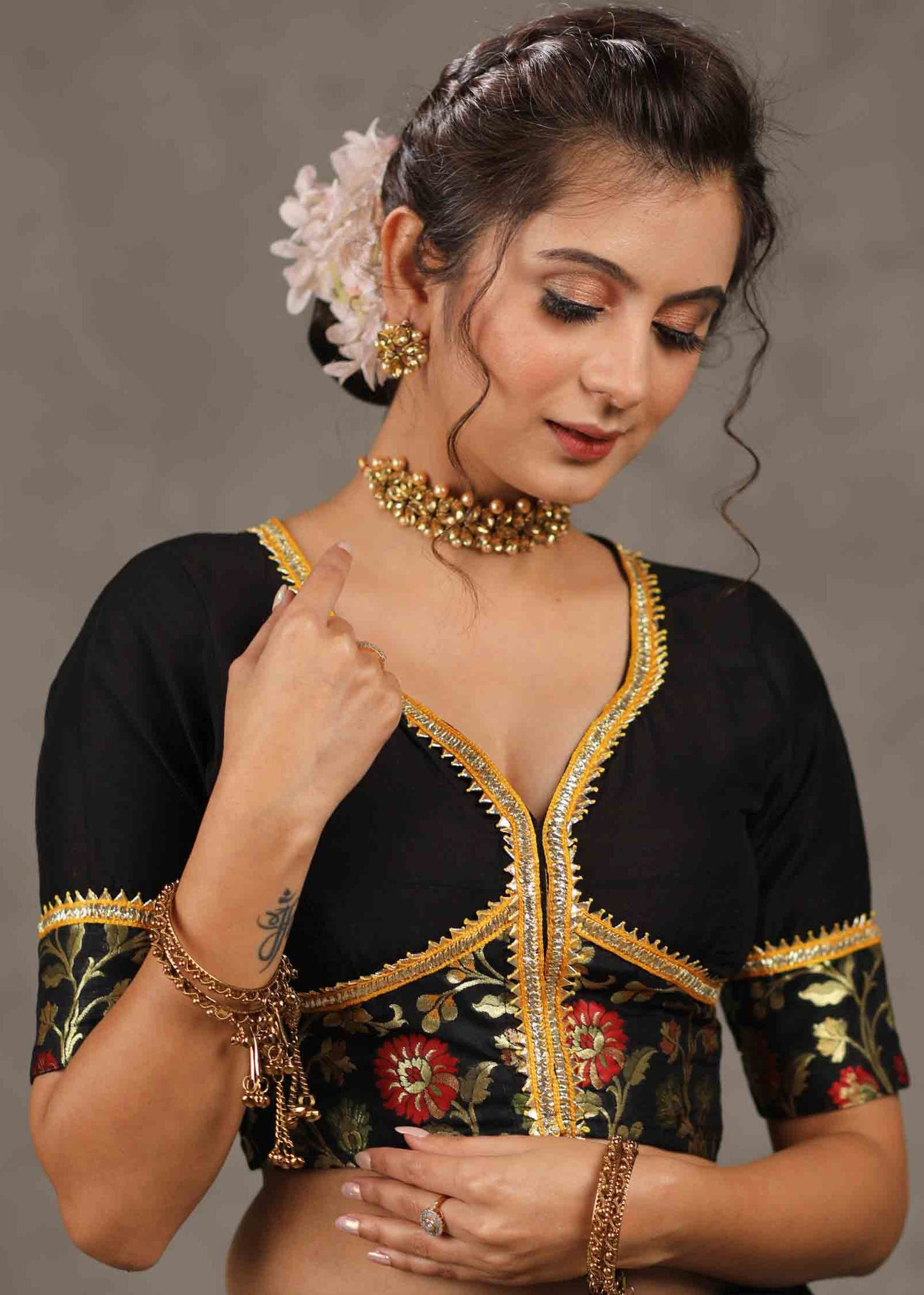 Elegant Black Cotton Silk Blouse with Brocade Detailing Highlighted with Gota Patti Lace