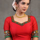Elegant Red Cotton Silk Blouse Highlighted with Kutch Mirror Work Patch on Sleeves and Neckline