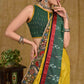 Stunning yellow Ghicha silk saree with Madhubani pallu and green Ikaat border