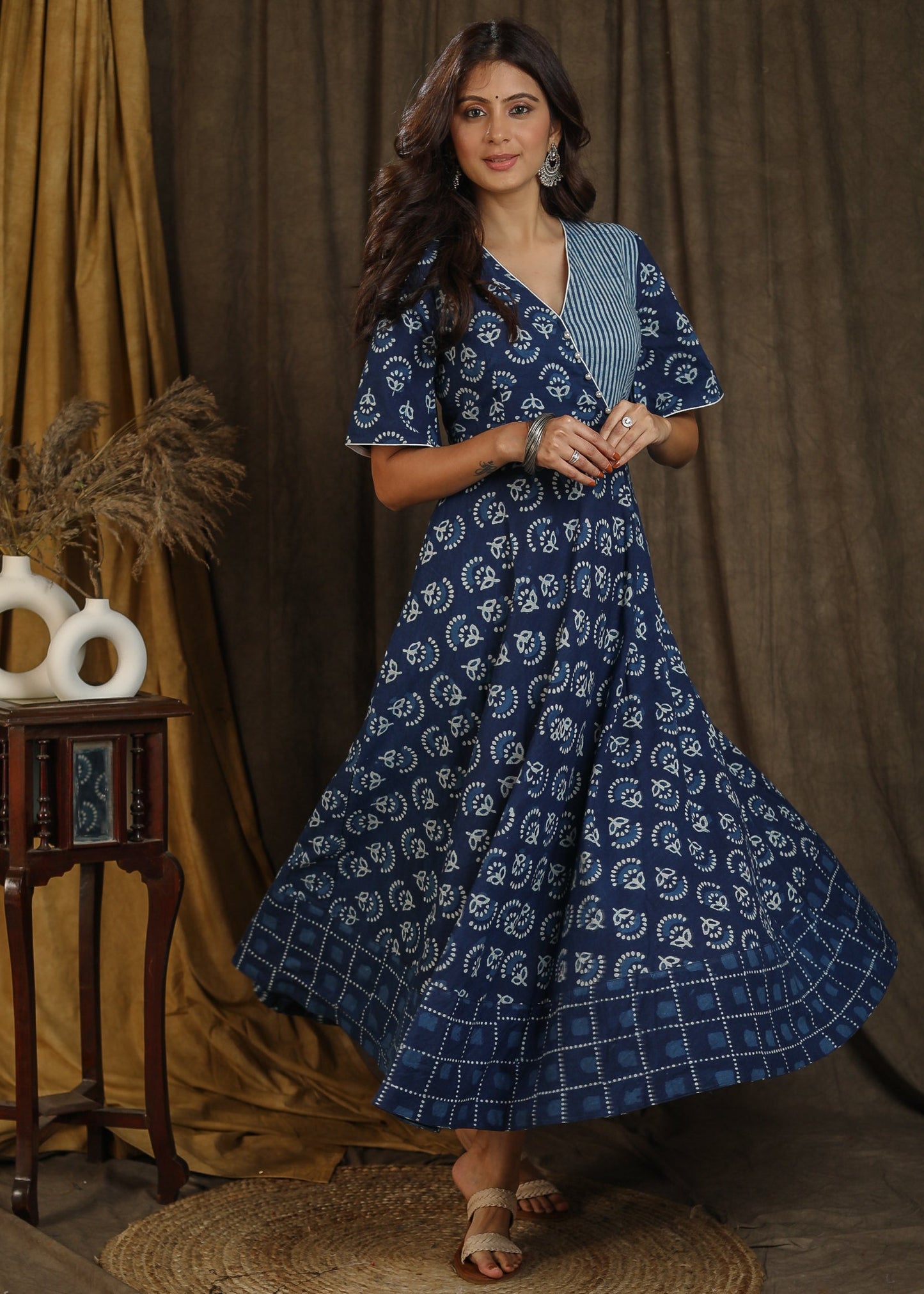 Trendy indigo gown with elbow sleeves and pearl embellishments