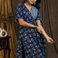 Trendy indigo gown with elbow sleeves and pearl embellishments