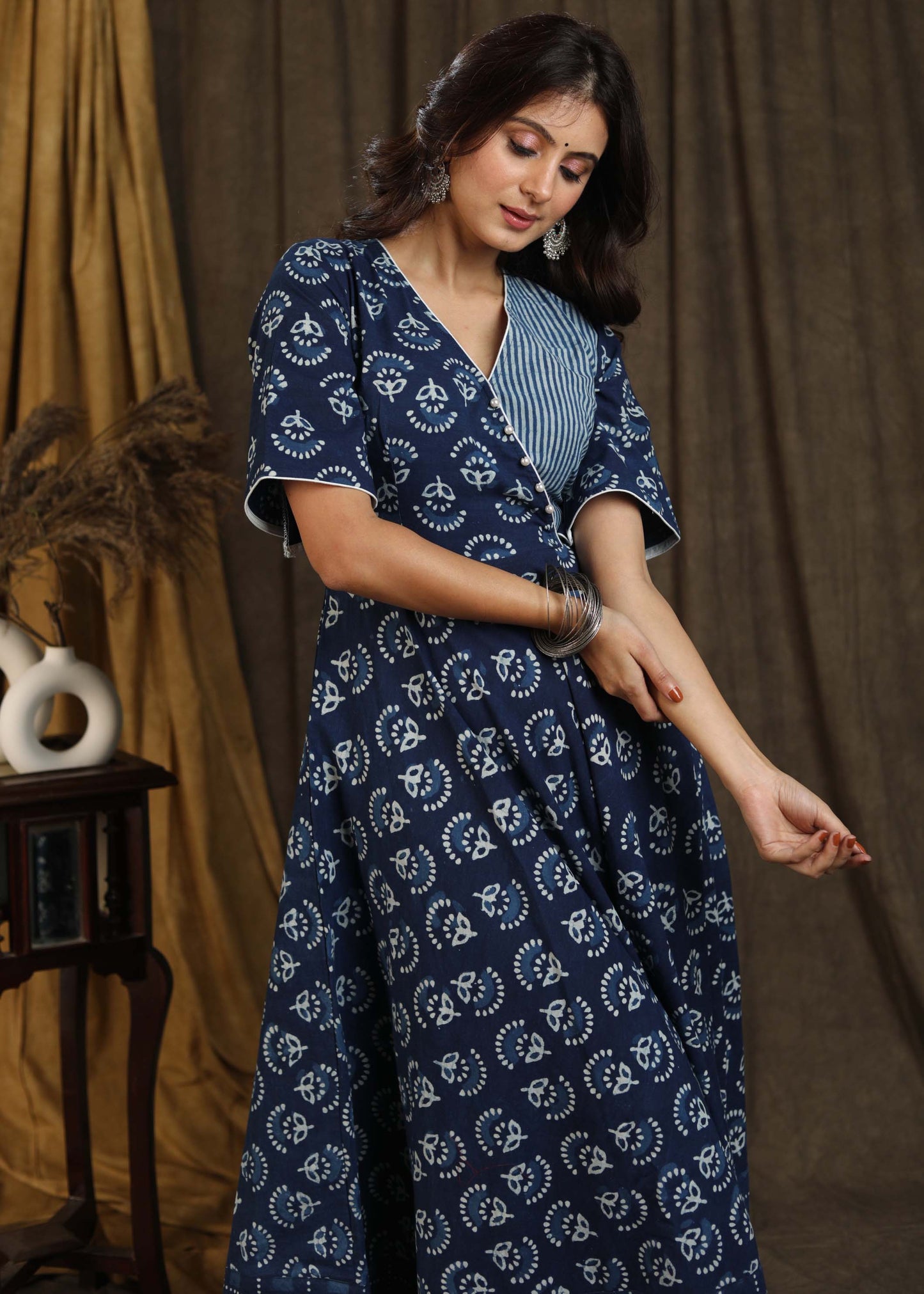 Trendy indigo gown with elbow sleeves and pearl embellishments
