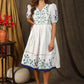 Stylish classic white  cotton silk gathered dress with elegant embroidery paired with chanderi sleeves
