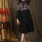 Trendy black cotton gathered dress with beautiful zari embroidery combined with chanderi sleeves