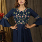 Classic navy blue gathered dress with bell sleeves and minimal floral embroidery