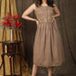 Subtle beige sleeveless gathered dress with beautiful hand embroidery
