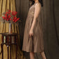 Subtle beige sleeveless gathered dress with beautiful hand embroidery