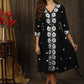 Classy black A-line dress with overall floral embroidery