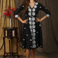 Classy black A-line dress with overall floral embroidery