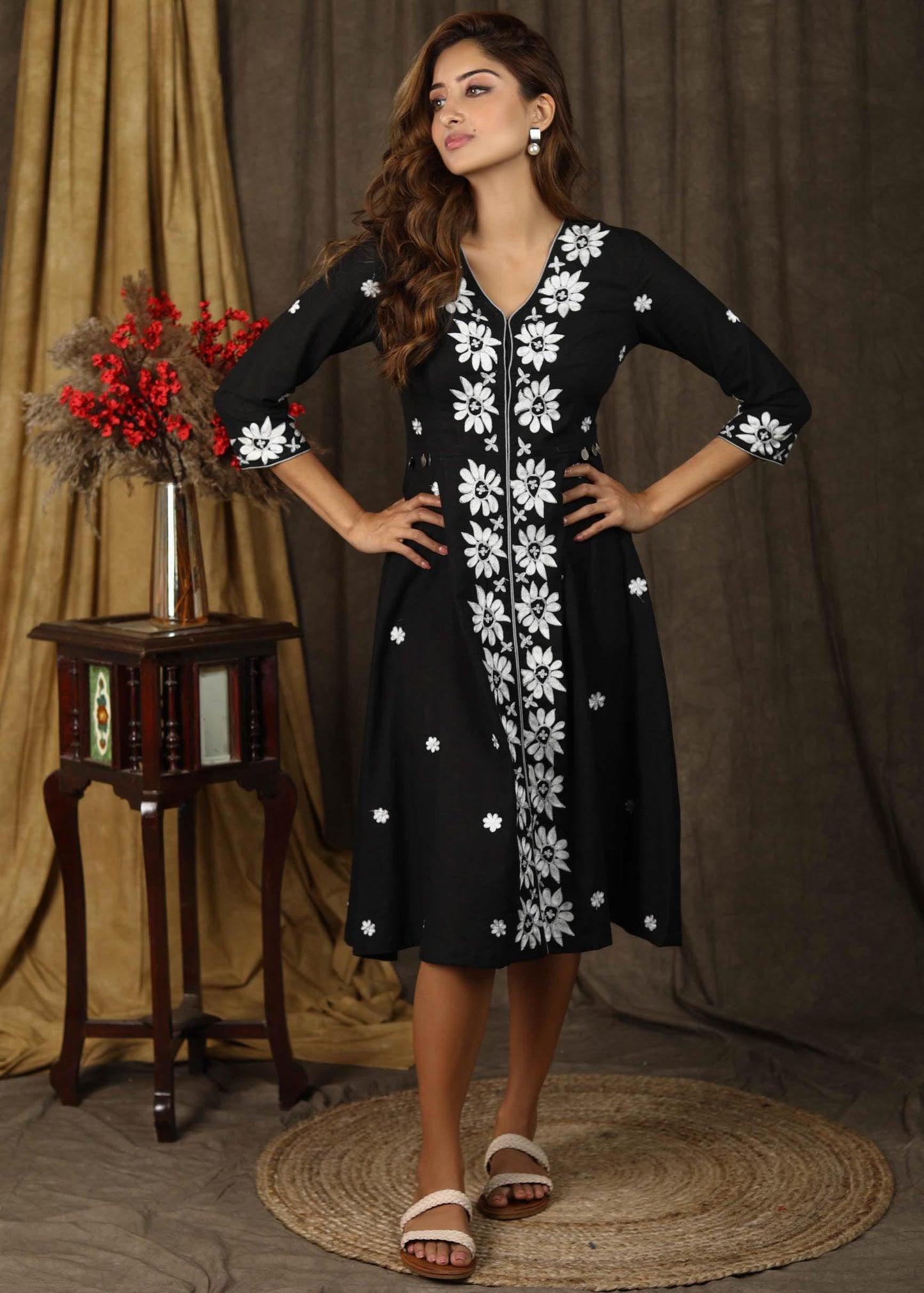 Classy black A-line dress with overall floral embroidery