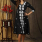 Classy black A-line dress with overall floral embroidery