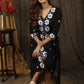 Classy black A-line dress with overall floral embroidery