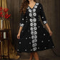 Classy black A-line dress with overall floral embroidery