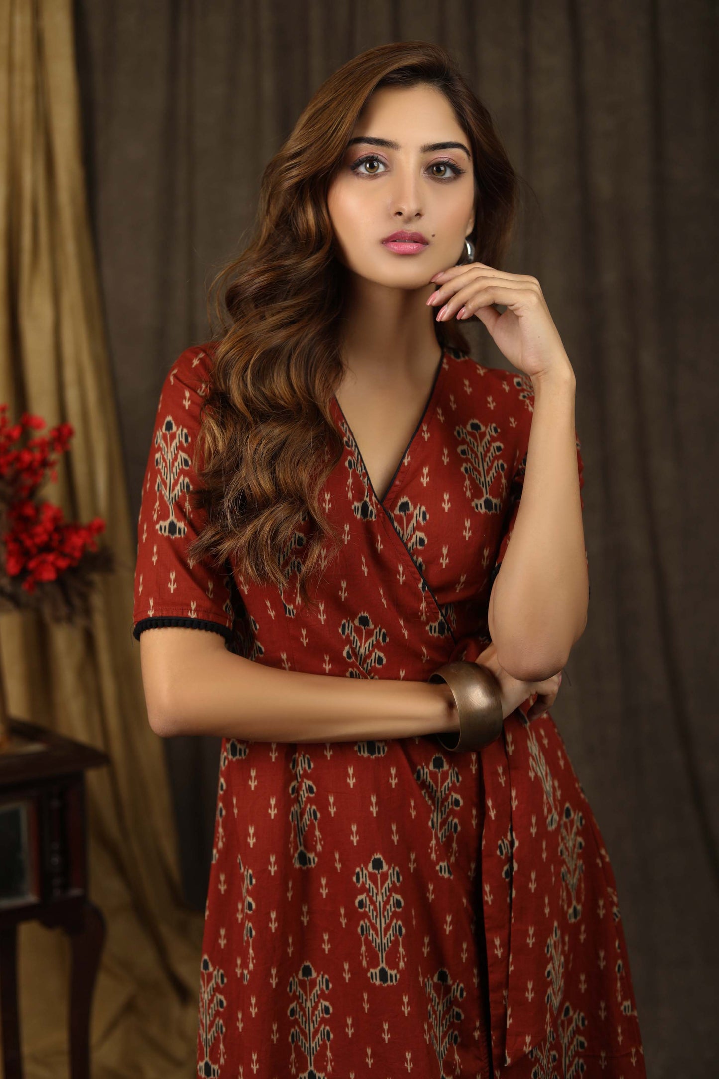 Trendy brick brown aztec print overlap dress highlighted with subtle pompom lace