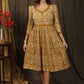 Casual mustard floral printed gathered dress with highlighted with beautiful pearl hand embroidery