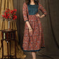 Elegant kalamkari dress with beautiful teal embroidered yoke