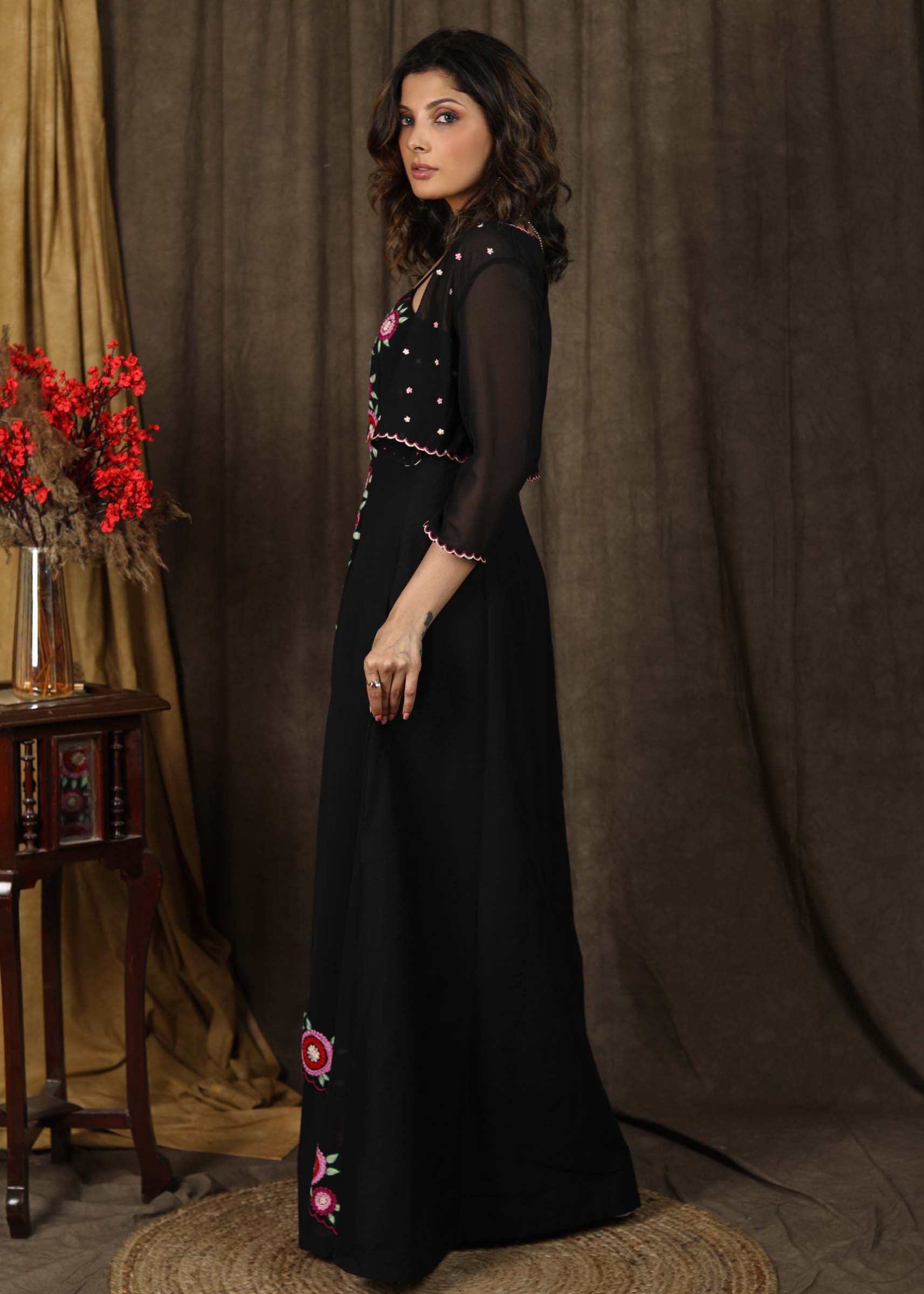 Classy black boho inspired strappy maxi dress with floral embroidery on front layer with optional georgette shrug Classy black boho inspired strappy maxi dress with floral embroidery on front layer with optional georgette shrug