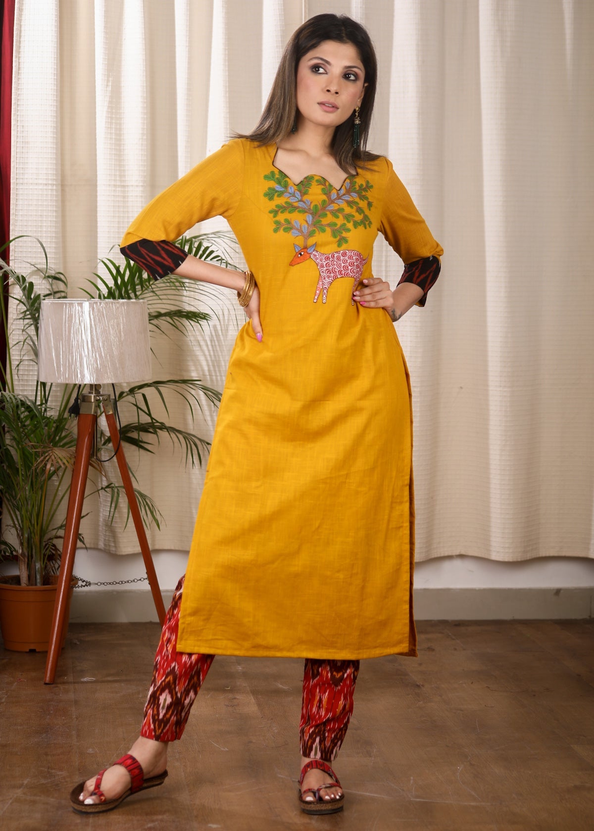Elegant Straight Cut Mustard and Ikat Combination Kurta With Authentic Hand Gond Painting on the Yoke