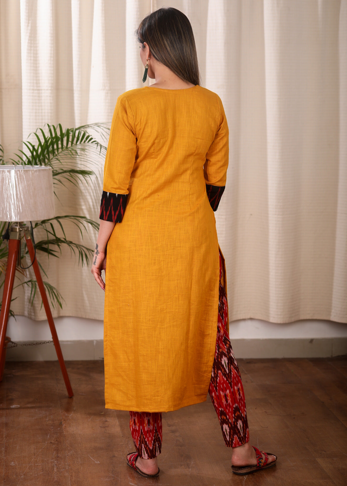 Elegant Straight Cut Mustard and Ikat Combination Kurta With Authentic Hand Gond Painting on the Yoke