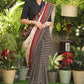 Regal cotton line Ajrakh saree with cream Pallu and Kalamkari border
