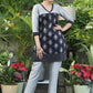 Stylish Black Printed Tunic with Grey Cotton Silk Yoke and Embroidered Border.