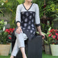 Stylish Black Printed Tunic with Grey Cotton Silk Yoke and Embroidered Border.
