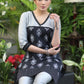 Stylish Black Printed Tunic with Grey Cotton Silk Yoke and Embroidered Border.