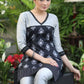 Stylish Black Printed Tunic with Grey Cotton Silk Yoke and Embroidered Border.