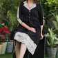 Exclusive Black Cotton Box Pleat Dress with Madhubani Printed Collar and Hem