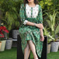 Classy Green Ikat A-Line Dress with Ethnic Embroidered Motifs on Yoke