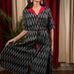 Black ikat dress with red silk collar
