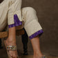 Casual off white cotton ankle length trouser with ikat hemline