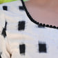 Smart Cream Ikat Blouse with Black Pompom Lace Detailing