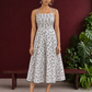 White Cotton Fit & Flare Midi Dress with Black Feather Print and Double Strap Detail — front view