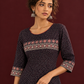 Elegant Black Ajrakh Polka Dot Printed Dress with Maroon Ajrakh Floral Border Yoke and Matching Sleeve Cuffs — fabric detail