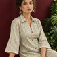 Sage Green Striped Cotton Shirt Dress with Contrast Buttons and Lace-Trimmed Cuffs — seated detail