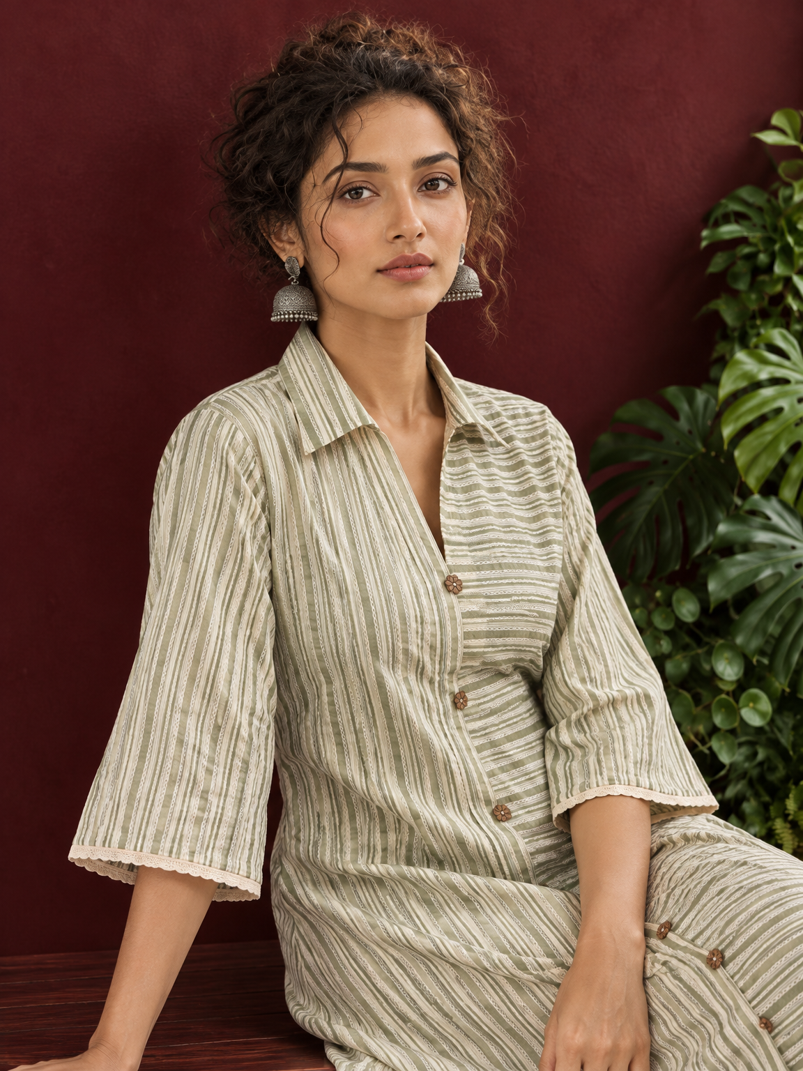 Sage Green Striped Cotton Shirt Dress with Contrast Buttons and Lace-Trimmed Cuffs — seated detail