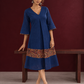 Timeless Navy Blue Cotton Dress with Kalamkari Print Hem Border & Contrast Neckline and Cuff Trim — front view