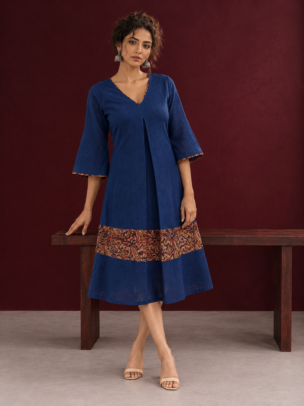 Timeless Navy Blue Cotton Dress with Kalamkari Print Hem Border & Contrast Neckline and Cuff Trim — front view