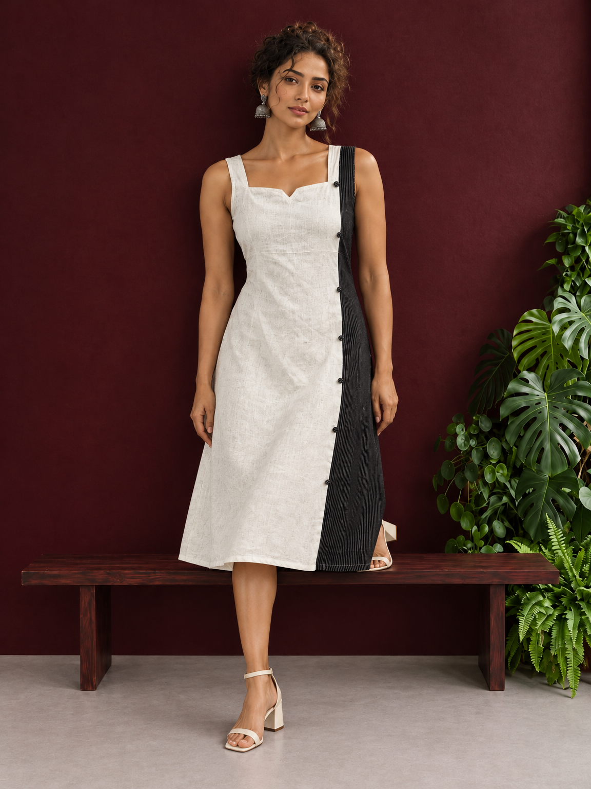 Elegant Off-White Cotton A-Line Dress with Contrast Black Pinstripe Side Panel & Button Detailing — side view