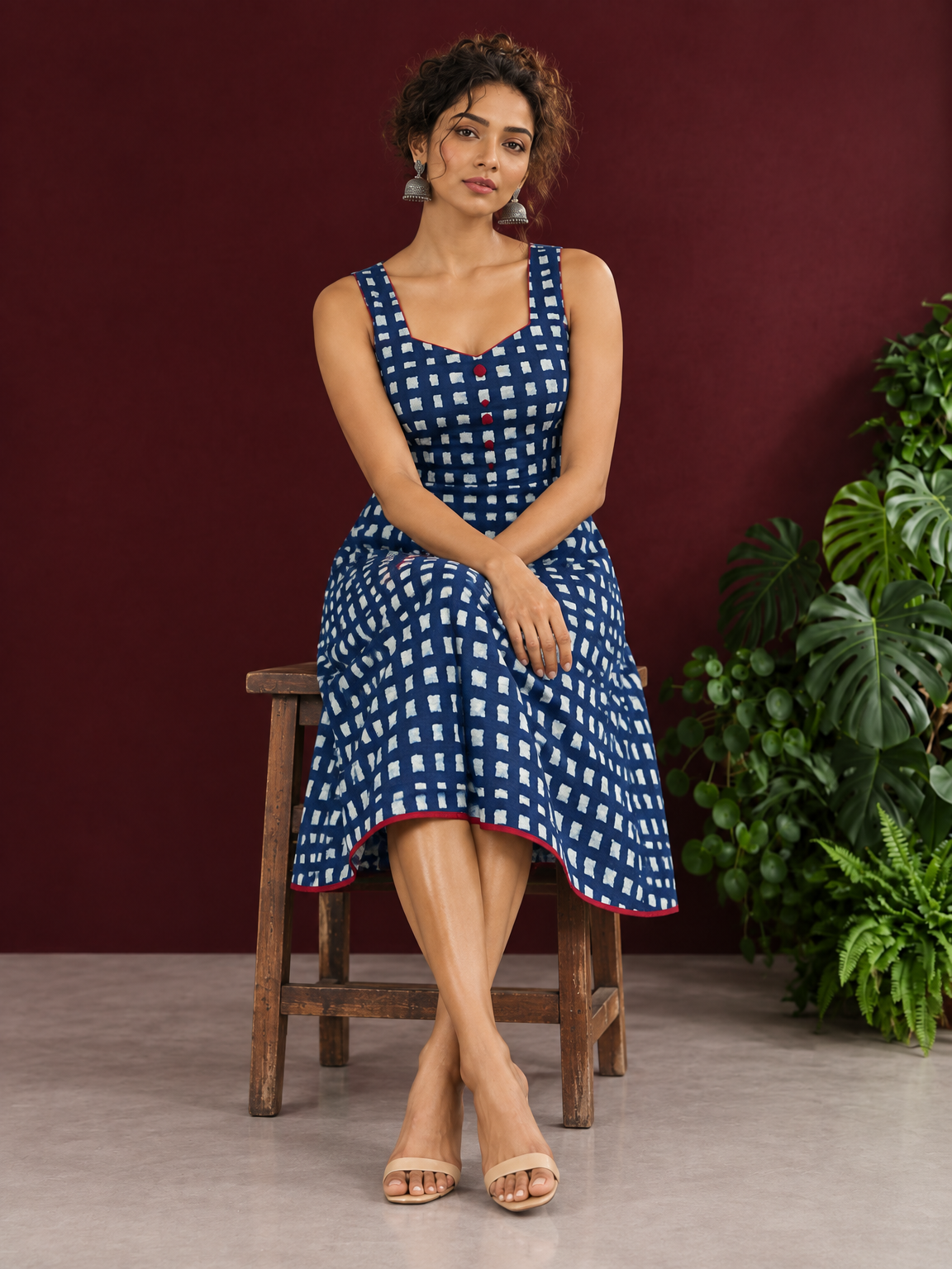 Indigo Blue Cotton One Piece Dress with Contrast Maroon Piping & Button Detail — seated