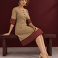 Timeless Beige Cotton A-Line Dress with Maroon Zigzag Print Sleeve Cuffs & Hem Border — seated