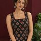 Classic Black Ajrakh Cotton Sleeveless Dress with Floral Print and Maroon Piping Square Neckline — fabric detail