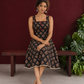 Classic Black Ajrakh Cotton Sleeveless Dress with Floral Print and Maroon Piping Square Neckline — seated