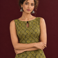 Olive Green Cotton A-Line Dress with Mustard Yellow Ajrakh Print and Keyhole Neckline — styled view