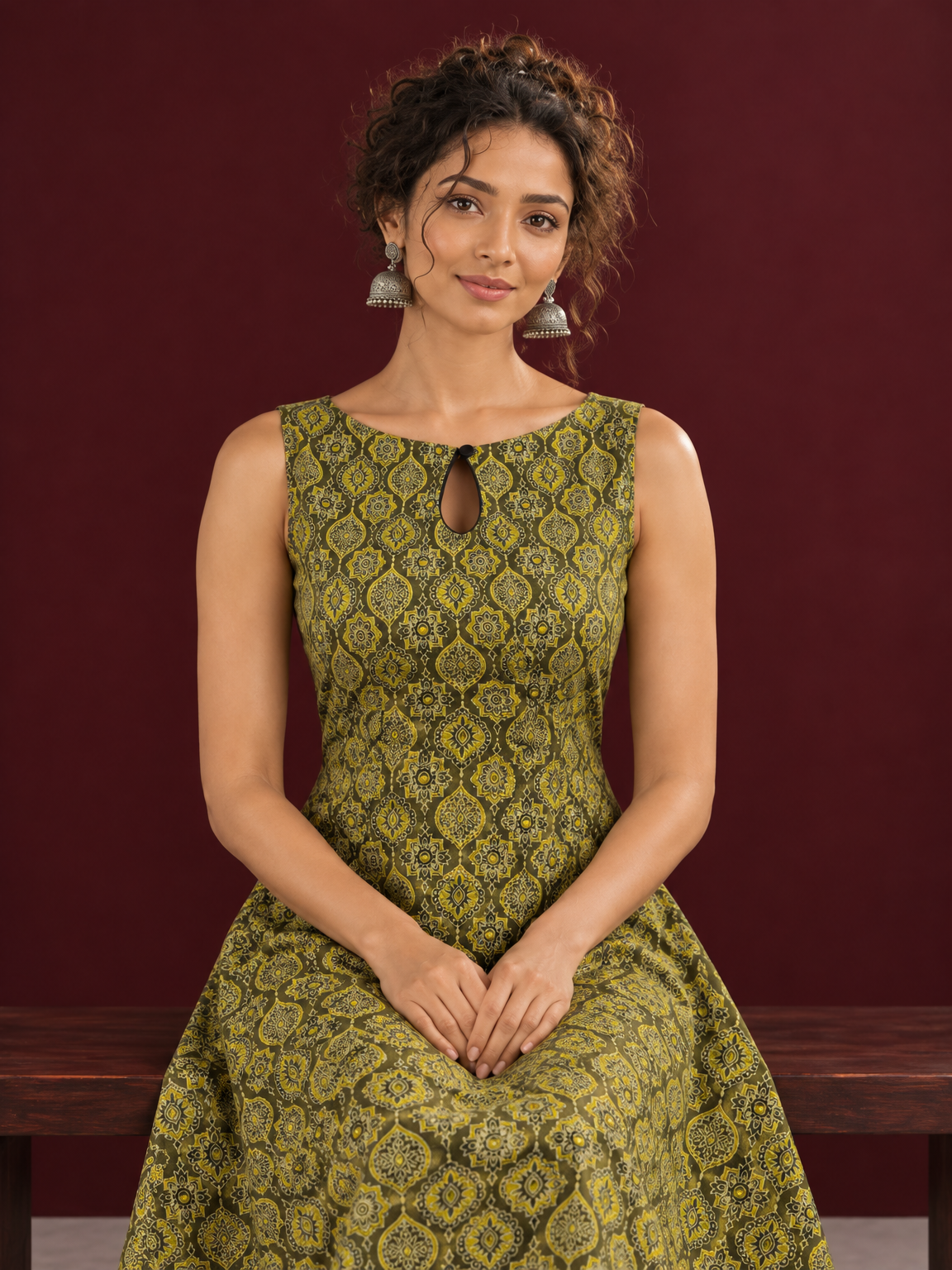 Olive Green Cotton A-Line Dress with Mustard Yellow Ajrakh Print and Keyhole Neckline — seated detail
